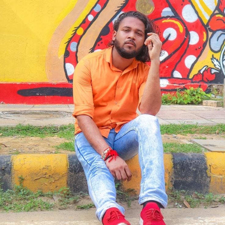 Avery Chen, Lead Design Curator at Gentle Path Ideas, reviewing corporate floral arrangements